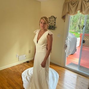 Ivory wedding dress never worn or altered